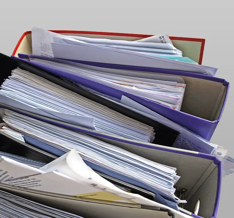 pile-with-protocol-binders-with-Paper-instead-of-Digital-Solutions